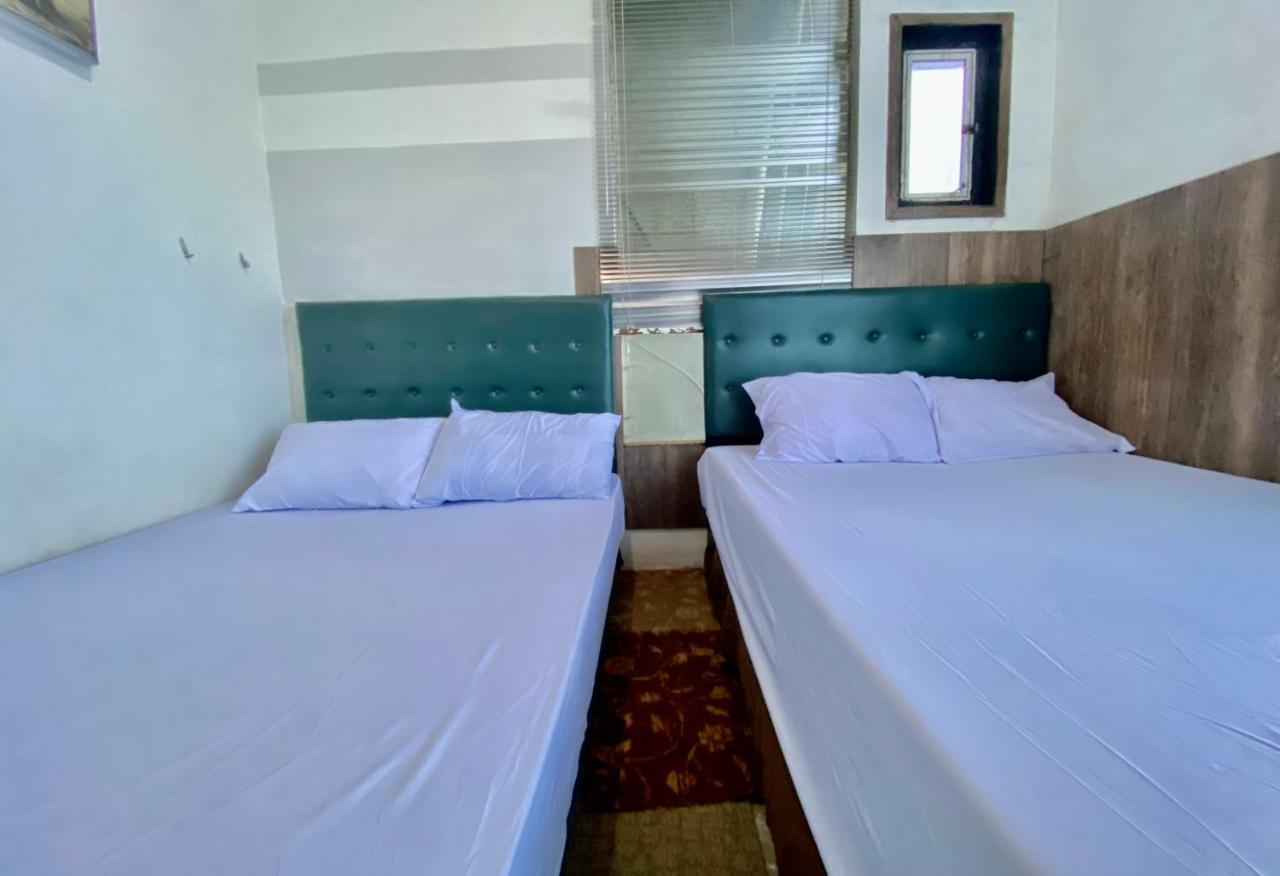 Homestay Batu Kelir Syariah Dieng Mitra Reddoorz Diyeng Экстерьер фото